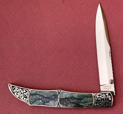 Harvey McBurnette Eagle Nest Engraved Lockback