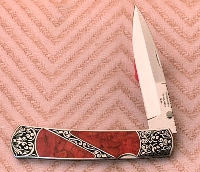 Harvey McBurnette Eagle Nest Engraved semi-precious stone Lockback
