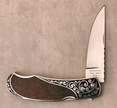 Harvey McBurnette Eagle Nest Engraved Lockback