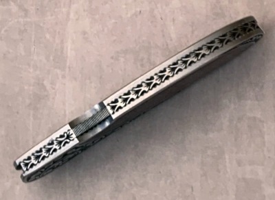 Harvey McBurnette Eagle Nest Engraved Lockback - 3