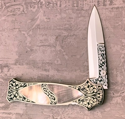 Harvey McBurnette Engraved Black Lip Pearl Lockback