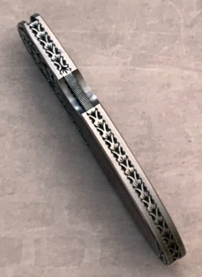 Harvey McBurnette Eagle Nest Engraved Malecite Lockback - 3