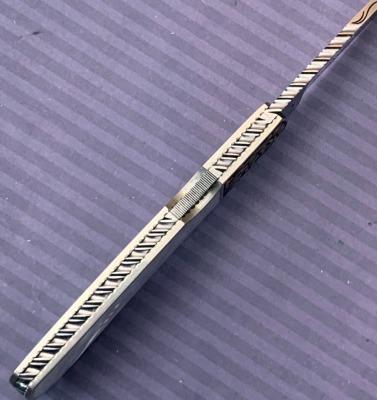Harvey McBurnette Eagle Nest Engraved Lockback - 3