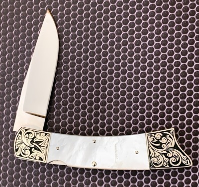 Harvey McBurnette Eagle Nest Engraved Pearl Lockback - 2