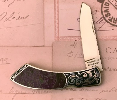 Harvey McBurnette Eagle Nest Engraved Lockback