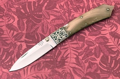 Harvey McBurnette Eagle Nest Engraved Lockback