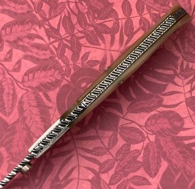 Harvey McBurnette Eagle Nest Engraved Lockback - 3