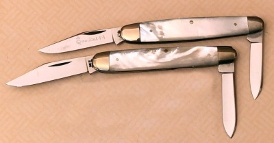 Pair of Pearl Sleeveboards: Case & Queen