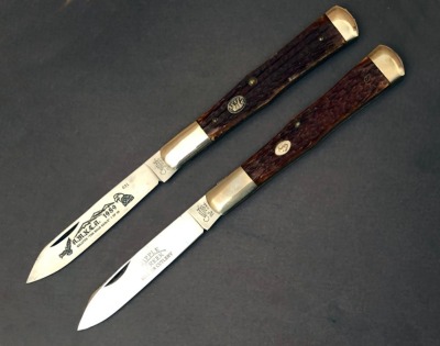 Pair of Cripple Creek Old Fort Bone Coke Bottle Folding Hunters