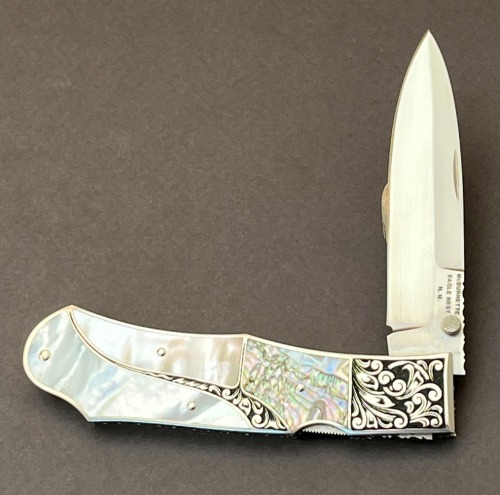 Harvey McBurnette Eagle Nest Pearl and Abalone Engraved Lockback