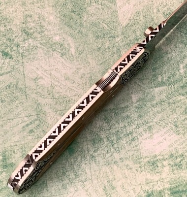 Harvey McBurnette Eagle Nest Mastodon Engraved Lockback - 3