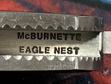 Harvey McBurnette Eagle Nest Engraved Pearl Lockback - 4