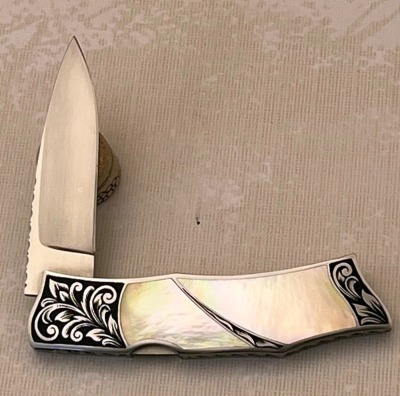 Harvey McBurnette Eagle Nest Pearl Engraved Lockback - 2