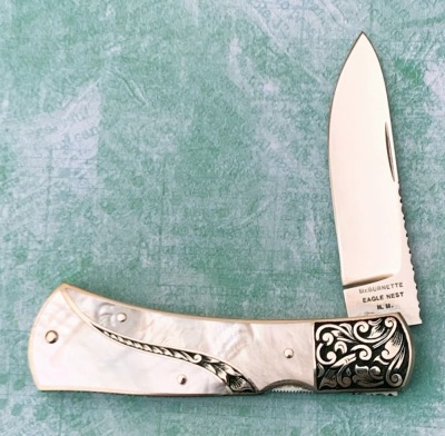 Harvey McBurnette Eagle Nest Pearl Engraved Lockback
