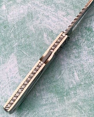 Harvey McBurnette Eagle Nest Pearl Engraved Lockback - 3