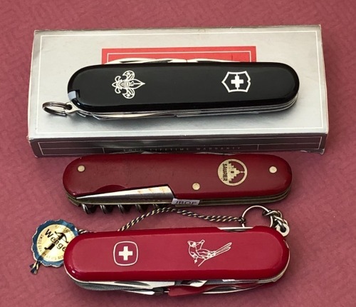Three Swiss Army Knives