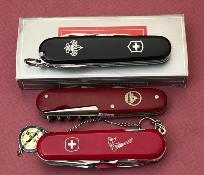 Three Swiss Army Knives