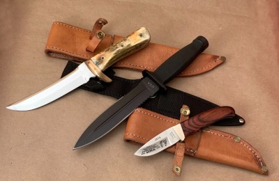 Three Fixed Blades: Stag Hunter, Military Style Dagger and a Clark Cut Co Drop Point