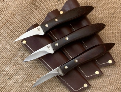 Three AMT Fixed Blades