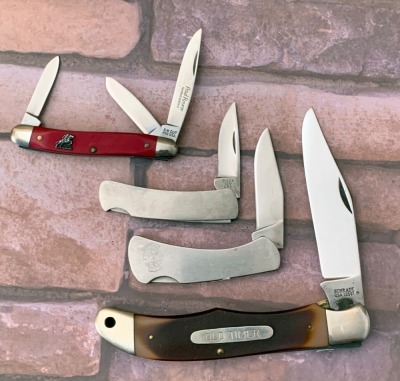 Four Folders: Buck USA, SW Cut, Schrade USA and Smith & Wesson
