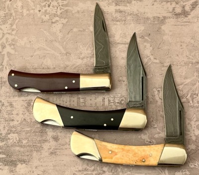 Three Parker Damascus Lockbacks