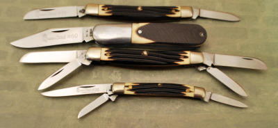 Four vintage Queen knives