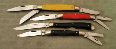 Four vintage Queen knives