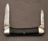 Case Brothers wood handled canoe. - 2