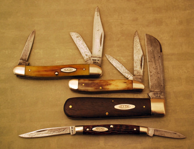 Four Used Case tradin' knives