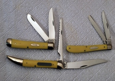 Three vintage yellow handled Case knives