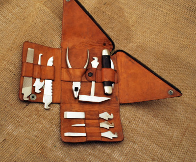 Clauss leather cased tool kit