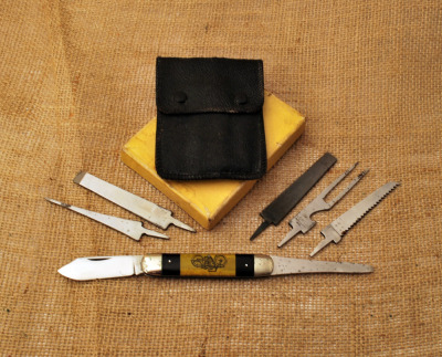 Aerial vintage leather cased tool kit