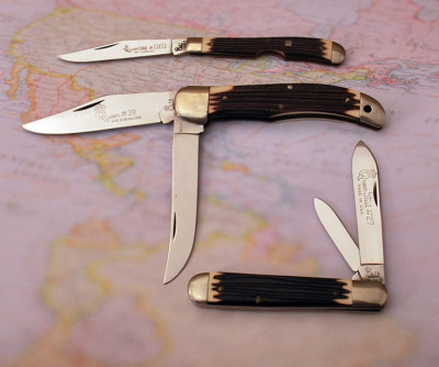 Three 70's-80's Queen knives
