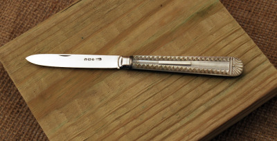 JY Cowlingshaw Sterling fruit knife with carved pearl and inlaid pins.