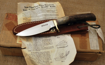 Randall LL Bean model model 8, hidden tang, slick back sheath. Mint with paper.