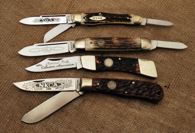 Four NKCA club knives
