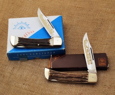 Pair of Eye Brand Stag lockback folding hunters