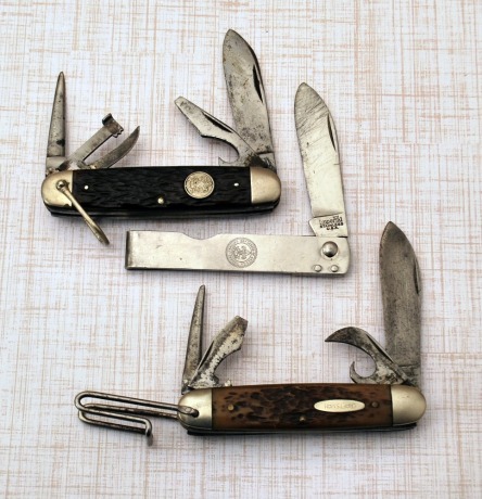 Three Scout Knives