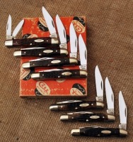 Seven Case vintage whittlers in pumpkin box