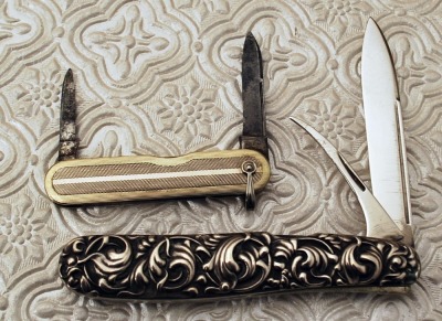 Two metal handled knives: Sterling Fruit and Remington pre-40