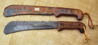 Case WWII Pilot's Survival machetes- one still in rubber coating