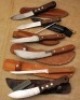 Six wood handled skinning knives