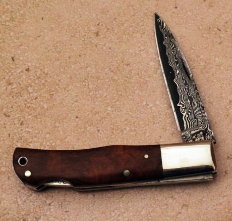 A. G. Russell burl wood folder