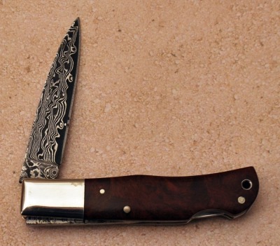 A. G. Russell burl wood folder - 2