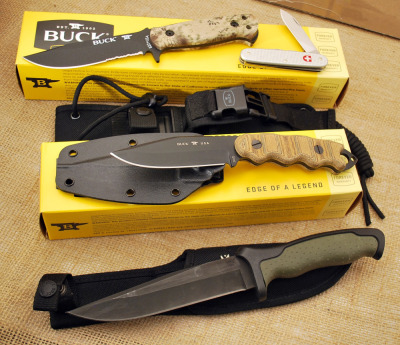 3 Buck Knives: Nighthawk, "Mat Would Go" and Sentry Camo plus a Victorinox all metal handle