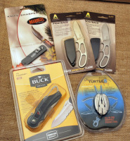 Five carded knives, 2 Kabar, Buck, Marbles, Turtle 8