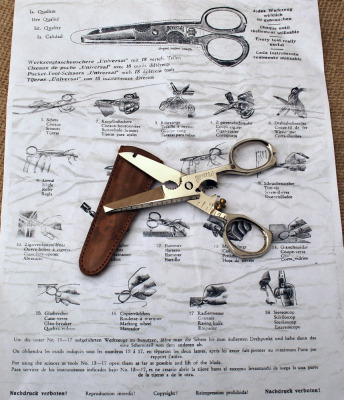 Vintage Universal multi-tool scissors with instructions