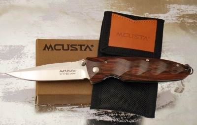 Mcusta sculpted wood folder