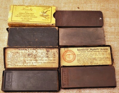 Four vintage razor hones, marked