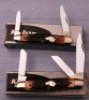 Two KA-BAR Bone Dogsheads